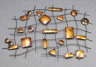 A shaped wrought metal wall sculpture 78cm x 61cm 