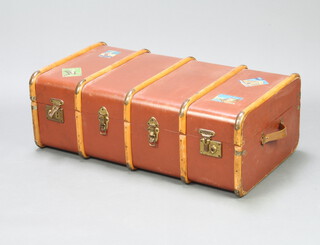 A brown fibre and wooden bound twin handled cabin trunk 32cm h x 90cm w x 53cm d  