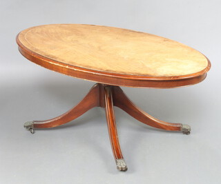 An oval Georgian style coffee table raised on pillar and tripod supports 53cm h x 123cm w x 71cm d (sun bleached, water marks) 