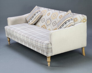 A 3 seat sofa upholstered in white and gold Kilim and check material 82cm h x 191cm w x 94cm d (slight stain to one arm) 