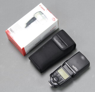 A Canon 580EX Speedlight flash, boxed