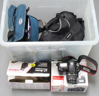 A collection of cameras and other equipment to include a Canon EOS 30D (carry bag, charger and battery with stock lens), an Olympus Camedia E-10 (in soft carry case), a Yashica 230-AF with stock lens and 75-300mm macro lens, a Zeiss Ikon 75mmm Pantar Lens and an AICO Anastigmat