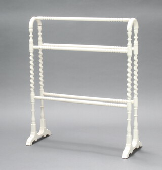 A Victorian white painted towel rail with spiral turned decoration 87cm h x 74cm w x 30cm d (damage to top right hand side) 