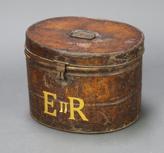 An oval twin handled metal hat box 30cm h x 43cm w x 37cm d 