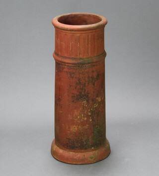 A circular terracotta chimney pot 75cm h x 28cm diam. 