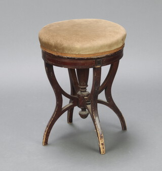 An Edwardian circular mahogany adjustable piano stool with upholstered seat 49cm h x 34cm diam. (old repair to the base) 