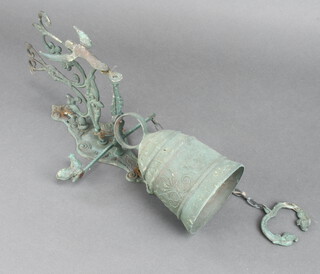 A verdigris metal wall mounting, monastery style doorbell 43cm x 20cm 