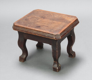 A rectangular hardwood stool raised on cabriole supports marked WHFB 31cm h x 38cm w x 32cm d 