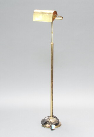 A bank light style standard lamp raised on a circular base 120cm h x 22cm diam. base 