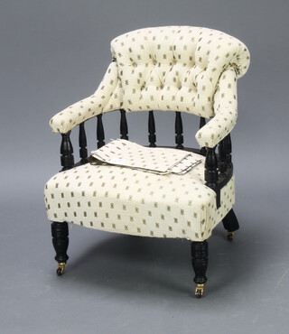 A Victorian ebonised tub back chair upholstered in blue material raised on turned supports 72cm h x 60cm w x 58cm d (part upholstered)