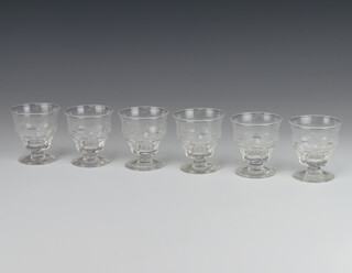 A set of six Stuart Crystal cock fighting glasses 7cm 