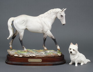 A Royal Doulton figure - Dessert Orchid DA134 no.1963 of 7500, modelled by J G Tongue, raised on a wood base 26cm (stuck ear) and a Beswick figure of a white West Highland Terrier 30cm 