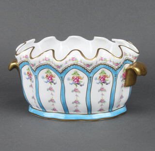 A Sevres style jardiniere decorated with spring flowers and gilt handles 28cm 