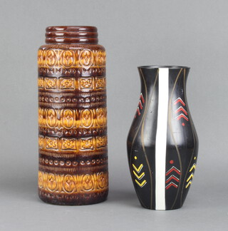 A Studio Pottery oviform vase with geometric decoration 33cm, a German lava vase 41cm 