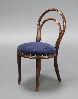 Thonet, a child's carved bentwood chair with upholstered seat raised on outswept supports 61cm h x 34cm, back right leg marked 7367 (front left leg is loose) 