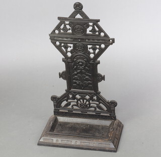 A Victorian pierced cast iron umbrella stand, complete with drip tray 69cm h x 39cm w x 21cm d (a/f)