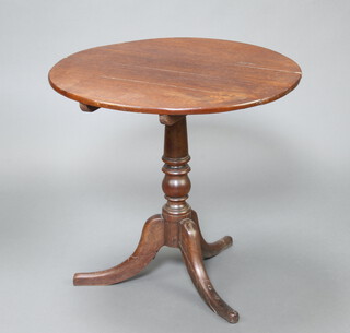 An 18th/19th Century oak snap top tea table raised on column and tripod base 70cm h x 75cm diam. (split to top, old repair to base) 