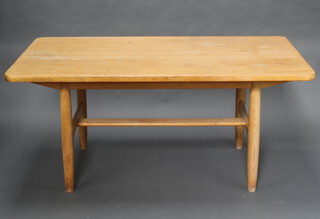 A Norwegian pine extending dining table raised on turned supports with H framed stretcher 74cm h x 90cm w (contact marks) 