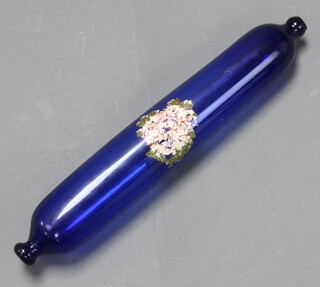 A Victorian blue glass painted rolling pin 40cm 