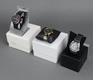 Three gentleman's wrist watches - Seiko, Timex and Seiko, boxed