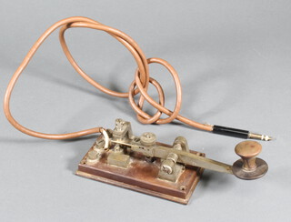 A brass morse key 5cm x 8cm 