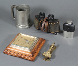 A 19th Century pewter mug with glass bottom, pair of field glasses, a hip fap and barometer together with a door knocker 