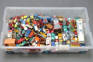 A quantity of Dinky, Matchbox and Corgi model toy cars, all play worned, contained in a clear plastic box 