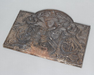 An arch shaped cast iron fireback 54cm h x 70cm w x 3cm d 