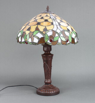 An Art Nouveau style table lamp with bronzed base and Tiffany style leaded glass shade 53cm 
