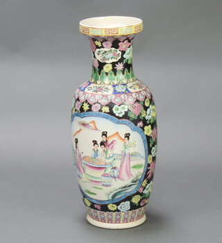 A Chinese famille verte club shaped vase decorated figures 63cm 