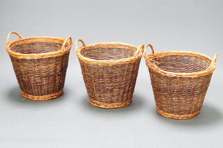 Three circular basket work twin handled log baskets 40cm h x 48cm diam. 