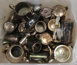 A collection of hotelware silver plate, contained in a plastic crate