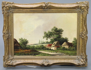 Early 20th Century oil on canvas, a country scene with figures before buildings 37cm x 53cm 