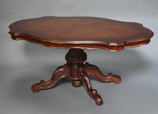 A Victorian style serpentine walnut pedestal dining table with crossbanded top on scroll legs 80cm h x 170 l x 110cm w 