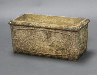 A well weathered rectangular concrete garden planter decorated a deer and faun, the interior marked Willow 26cm h x 58cm x 29cm 