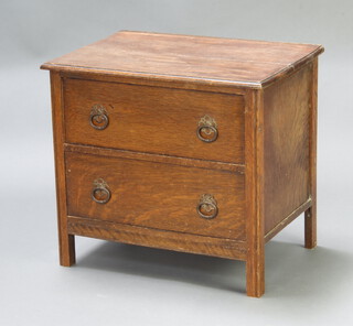 A 1930's oak chest of 2 long drawers with ring drop handles 55cm h x 61cm w x 43cm d (2 small holes to the top) 
