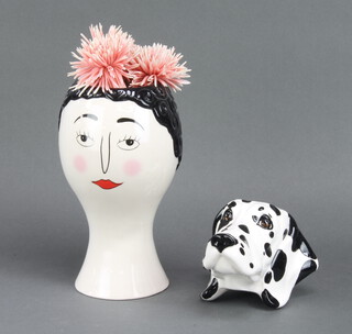 A continental ceramic wall pocket in the form of a Dalmatian's head and a vintage style portrait vase