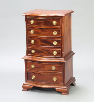 A Georgian style miniature mahogany chest on chest of serpentine outline, fitted 6 drawers, raised on ogee bracket feet 75cm h x 41cm w x 30cm d (in 2 sections) 