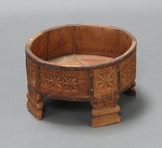 A circular carved Eastern hardwood and metal banded jardiniere 20cm h x 33cm diam. 