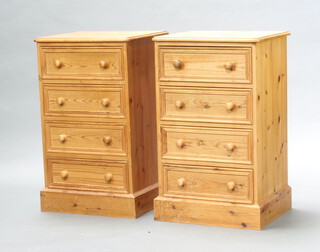 A pair of Victorian style D shaped pine chests of 4 drawers, raised on platform bases 86cm h x 53cm w x 44cm d  (some water marks in places) 