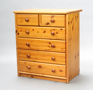 A pine chest of 2 short and 4 long drawers with tore handles 91cm h x 83cm w x 49cm d (contact marks)