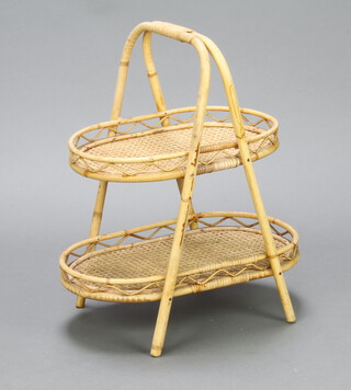 A bamboo and wicker oval 2 tier stand 53cm h x 52cm x 30cm 