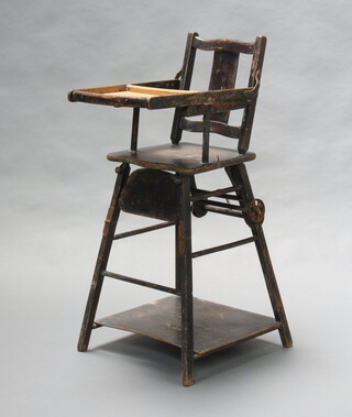 A child's Edwardian beech and plywood metamorphic folding high chair 96cm h x 45cm w x 49cm d 
