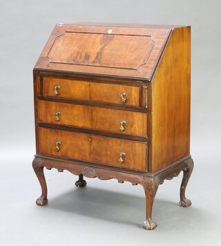 A Georgian style mahogany bureau, the fall front above 3 long graduated drawers, raised on cabriole supports 100cm h x 75cm w x 46cm d (fall front slight warp) 
