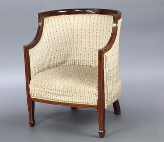 An Edwardian inlaid mahogany tub back armchair upholstered in Regency striped material raised on square supports 80cm h x 63cm x 56cm d (seat 34cm x 39cm) 