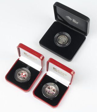 Three silver presentation 50 pence pieces - VE Day 1945 2020, Withdrawal From the European Union 2020 and Father Christmas 2019 