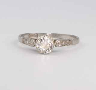 A white metal stamped Plat single stone mine cut diamond ring 2.4 grams, approx. 0.6ct, size M 1/2