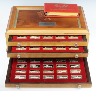 A set of Franklin Mint sterling silver commemorative ingots "The Worlds Greatest Racing Cars" (75) 2183 grams  