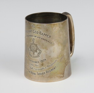 A silver presentation mug inscribed "To Sergeant G E O Napper, on the occasion of his marriage 18th September 1924 front The Warrant Officers Staff Sergeants and Sergeants Fourth Battalion The Royal Sussex Regiment" London 1924, 9cm, 160 grams 