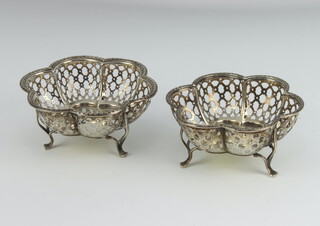 A pair of pierced silver bon bon dishes raised on scroll feet Birmingham 1946, 9.5cm, 110 grams
 